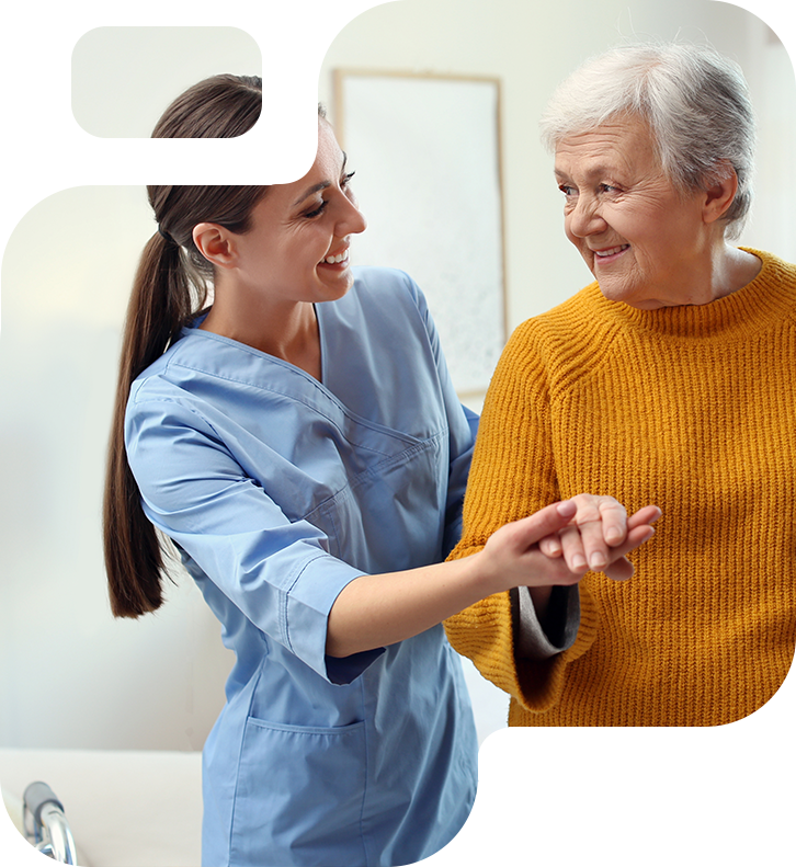 Opiekunka uśmiechająca się do swojej Podopiecznej